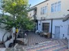 .В поселке Кашле города Баку продается неотремонтированный 2-х этажный 12-комнатный дом.